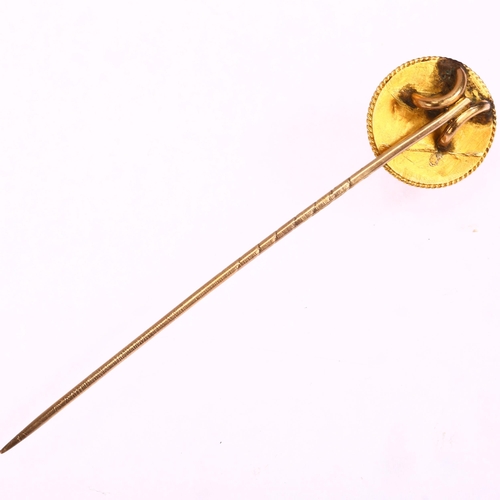 1206 - A Victorian Etruscan Revival garnet stickpin, unmarked gold settings with round cabochon garnet, hea... 