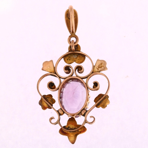 1207 - An Edwardian 9ct rose gold amethyst and pearl openwork pendant, height 36.4mm, 2.1g