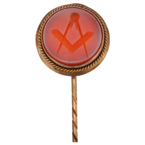 1210 - A Victorian sardonyx Masonic intaglio seal stickpin, unmarked yellow metal settings, head diameter 1... 