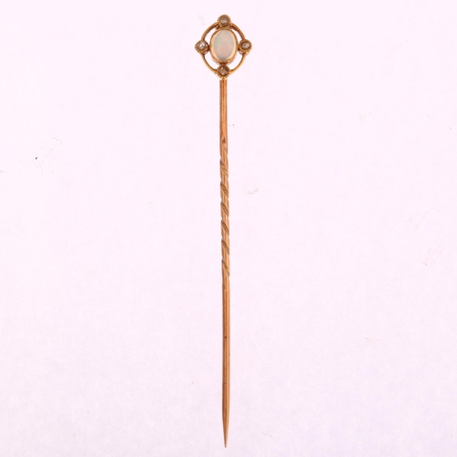 1214 - An Edwardian 15ct gold opal and diamond openwork stickpin, set with oval cabochon opal and rose-cut ... 