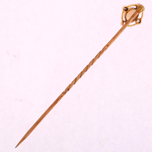 1214 - An Edwardian 15ct gold opal and diamond openwork stickpin, set with oval cabochon opal and rose-cut ... 