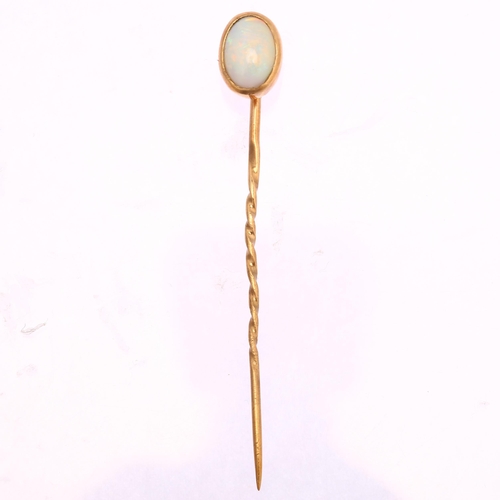 1215 - An opal stickpin, unmarked gold settings with oval cabochon opal, head height 9.9mm, overall 55mm, 1... 