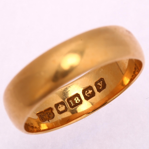 1228 - An early 20th century 18ct gold wedding band ring, maker RP, Birmingham 1923, band width 6.2mm, size... 