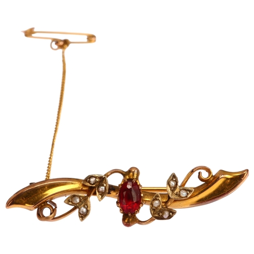 1243 - An Edwardian 9ct gold garnet-topped doublet and split pearl bar brooch, length 43.3mm, 2.7g