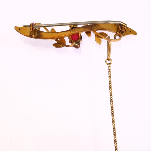 1243 - An Edwardian 9ct gold garnet-topped doublet and split pearl bar brooch, length 43.3mm, 2.7g