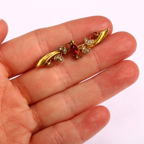 1243 - An Edwardian 9ct gold garnet-topped doublet and split pearl bar brooch, length 43.3mm, 2.7g