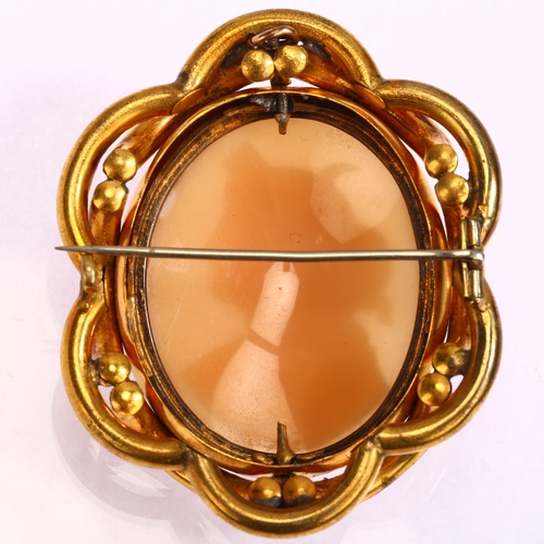 1244 - A Victorian shell cameo brooch, relief carved depicting Selene, Greek Goddess of the moon, in gilt-m... 