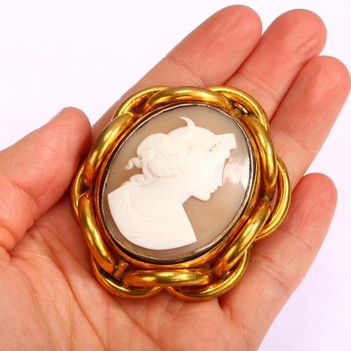 1244 - A Victorian shell cameo brooch, relief carved depicting Selene, Greek Goddess of the moon, in gilt-m... 