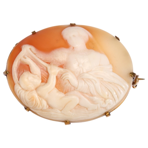 1245 - A Victorian shell cameo brooch, relief carved depicting mother and child, in gilt-metal frame, width... 