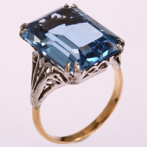 1246 - A 9ct gold blue topaz dress ring, setting height 16.4mm, size K, 5.1g