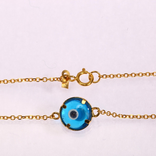 1249 - A modern 14ct gold blue glass 'Evil Eye' bracelet, length 16cm, 1.2g