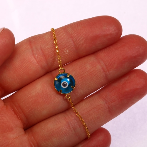 1249 - A modern 14ct gold blue glass 'Evil Eye' bracelet, length 16cm, 1.2g