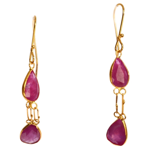 1252 - A pair of 14ct gold ruby drop earrings, set with pear-cut rubies with shepherd hook fittings, height... 