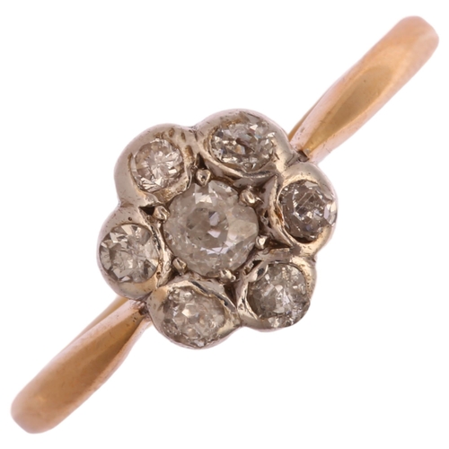 1253 - An 18ct gold diamond flowerhead cluster ring, set with old-cut diamonds, total diamond content appro... 