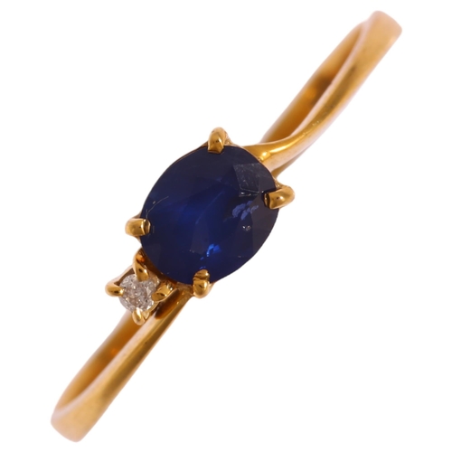 1255 - A 14ct gold sapphire and diamond dress ring, set with oval mixed-cut sapphire and modern round brill... 