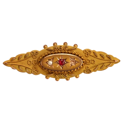 1271 - A Victorian 9ct gold garnet and pearl memorial brooch, maker M&G, length 40.7mm, 3.2g