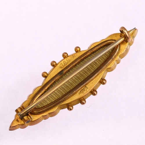 1271 - A Victorian 9ct gold garnet and pearl memorial brooch, maker M&G, length 40.7mm, 3.2g