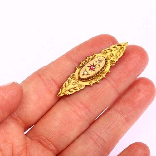 1271 - A Victorian 9ct gold garnet and pearl memorial brooch, maker M&G, length 40.7mm, 3.2g