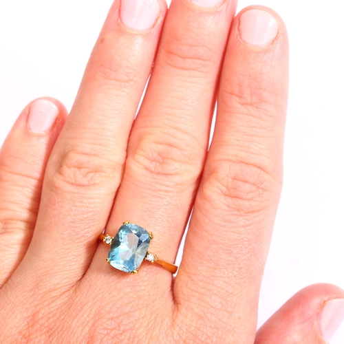 1277 - A 14ct gold aquamarine and diamond ring, set with cushion-cut aquamarine and modern round brilliant-... 