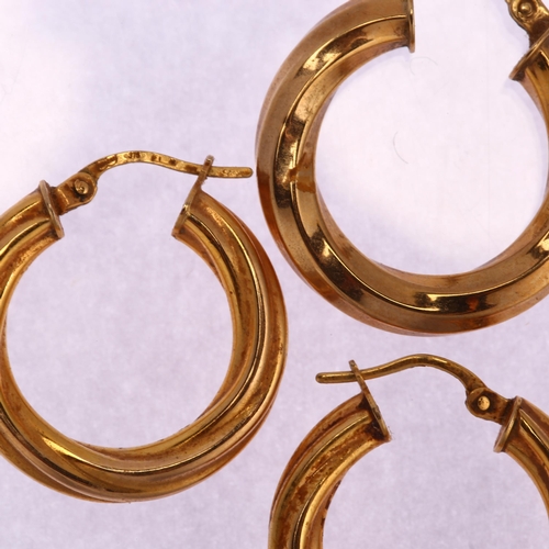 1284 - A pair of 9ct gold twisted hoop earrings, and another single example, pair diameter 22.4mm, 2.8g tot... 