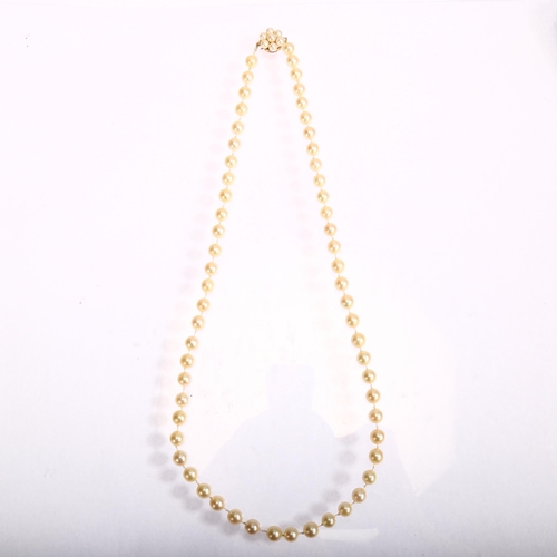 1290 - A single-strand cultured pearl bead necklace, with 9ct pearl flowerhead cluster clasp, length 52cm, ... 