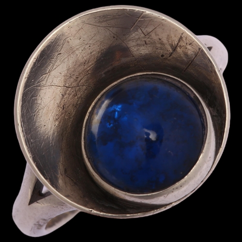 1296 - N E FROM - a Danish sterling silver ring, with cabochon blue glass panel, setting width 15mm, size N