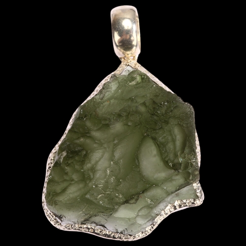 1298 - A moldavite natural green glass and silver-mounted pendant, length excluding bale 37mm, modern hallm... 