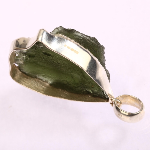 1298 - A moldavite natural green glass and silver-mounted pendant, length excluding bale 37mm, modern hallm... 