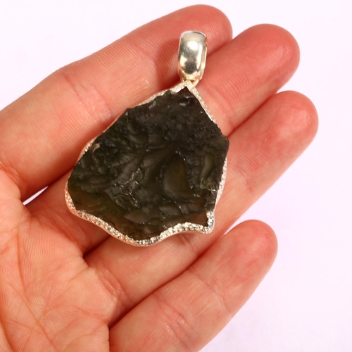 1298 - A moldavite natural green glass and silver-mounted pendant, length excluding bale 37mm, modern hallm... 