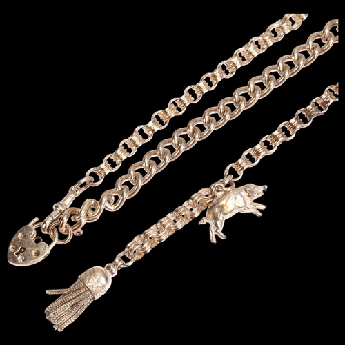 1310 - A silver mixed link necklace, with intermittent filigree ball links and a pig design fob, length 60c... 