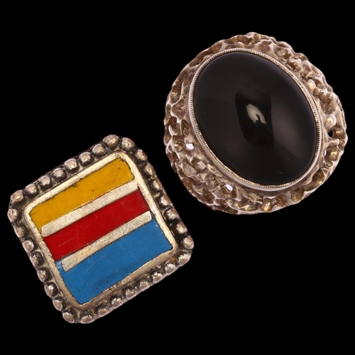 1311 - A large cast silver black onyx signet ring, setting width 25mm, size S, 11.3g, and an unmarked white... 