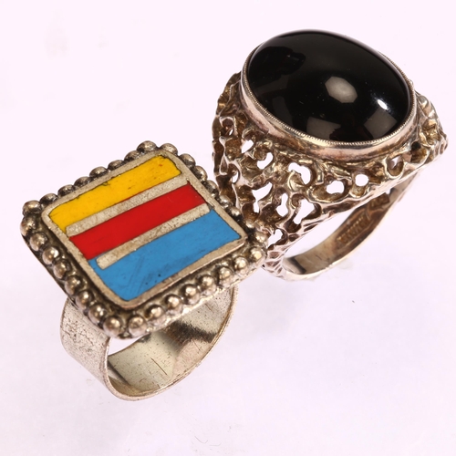 1311 - A large cast silver black onyx signet ring, setting width 25mm, size S, 11.3g, and an unmarked white... 