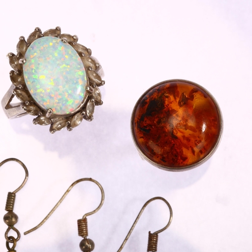 1317 - A mixed group of jewellery, comprising synthetic opal set ring, unmarked settings, setting height 21... 