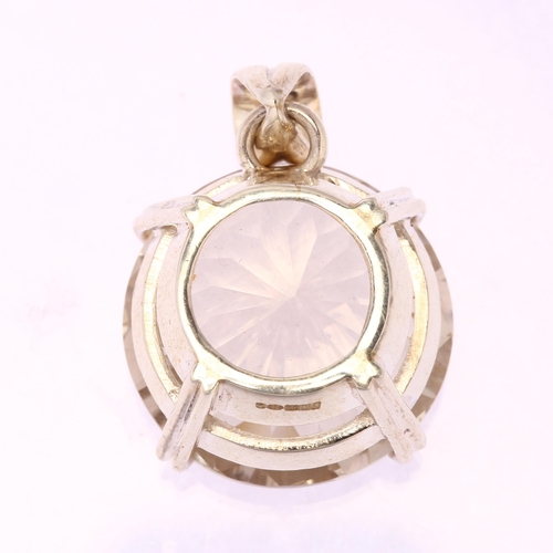 1324 - A modern silver and laser-cut quartz pendant, diameter 23mm, 12.5g