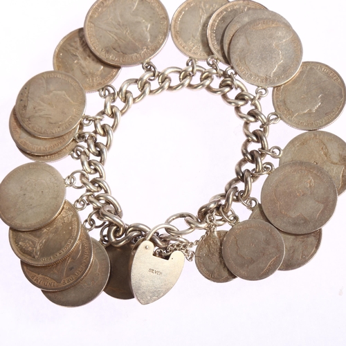 1325 - A coin-mounted silver charm bracelet, and a Maria Theresa 1780 silver coin in silver pendant mount, ... 