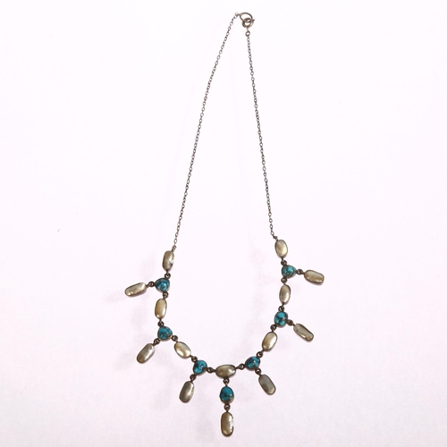 1335 - A silver turquoise and mother-of-pearl set fringed necklace, mid-20th century, length 41cm, unmarked... 