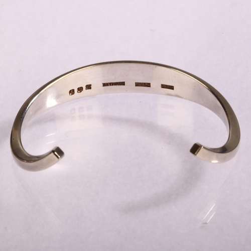 1337 - FRANK AHM - a Danish modernist sterling silver plain form cuff bangle, model no. 580, setting height... 