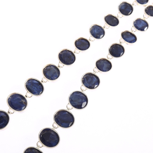 1343 - A large graduated natural cut sapphire set silver necklace, length 48cm, largest sapphire 19mm, 100g