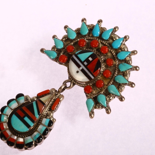 1351 - A Native American silver drop pendant brooch, Zuni (Leo Poblano), inlaid with jet coral mother-of-pe... 