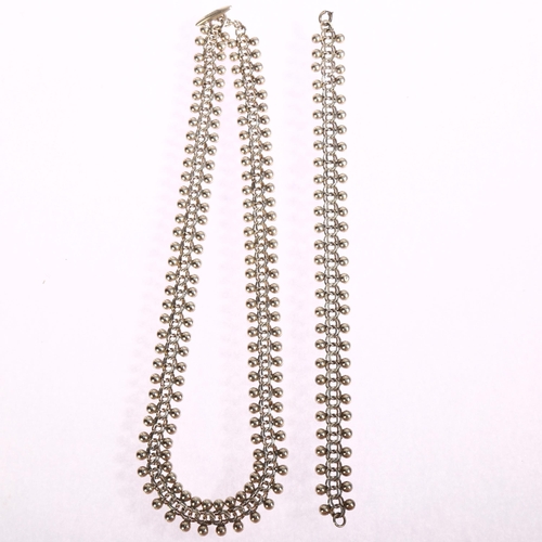 1352 - HERMANN SIERSBOL - a sterling silver bead and chain necklace, length 41cm, and matching bracelet, le... 