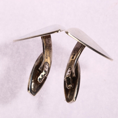 1361 - HANS HANSEN - a pair of sterling silver Delta wing design cufflinks, model no. 640, length 25mm, 17.... 