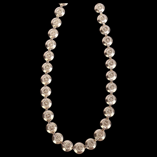 1372 - HERMANN SIERSBOL - a sterling silver circular panel necklace, length 39cm, 24.5g