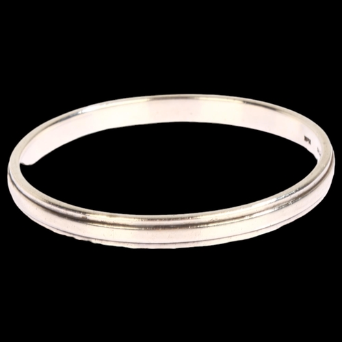 1390 - HANS HANSEN - a sterling silver plain form circular bangle, internal diameter 64mm, 37g