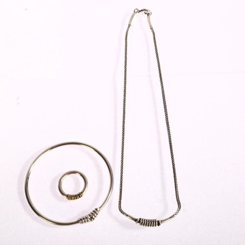 1394 - A sterling silver necklace bangle and ring, all with wrap-around design, 44g total