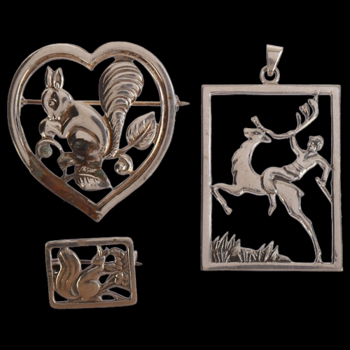 1396 - C BRUMBERG HANSEN - a silver pendant with deer and figure, length 45mm, and 2 other silver squirrel ... 