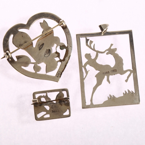 1396 - C BRUMBERG HANSEN - a silver pendant with deer and figure, length 45mm, and 2 other silver squirrel ... 