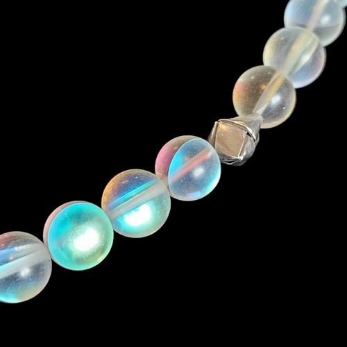 1330 - An opalite bead necklace with natural aquamarine crystal pendant below, by Tessa Sambrook (ROKZ), si... 