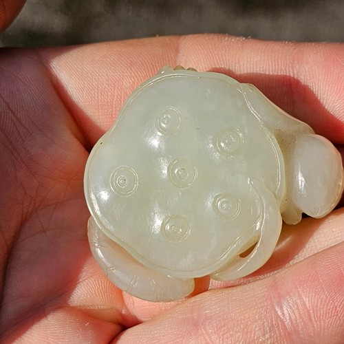 116 - A group of Chinese jade and hardstone carvings, bangles and pendants