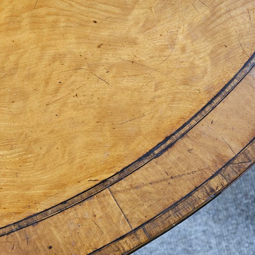 75 - A 19th century satinwood demi-lune fold over card table, with rosewood inlaid top, the base having b... 