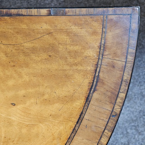 75 - A 19th century satinwood demi-lune fold over card table, with rosewood inlaid top, the base having b... 